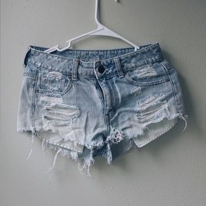 High waisted light wash distressed shorts